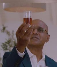 Mohammed Hussain Head Shot Holding Tea Glass